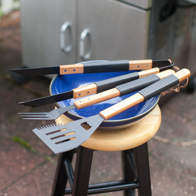 BRINKMANN® 3-Piece BBQ Tool Set - Perfect for your next barbecue, this 3-piece set features a spatula with a built-in bottle opener and serrated edge, a barbecue fork and tongs.  All utensils are made of steel with non-stick surfaces and wooden handles.
